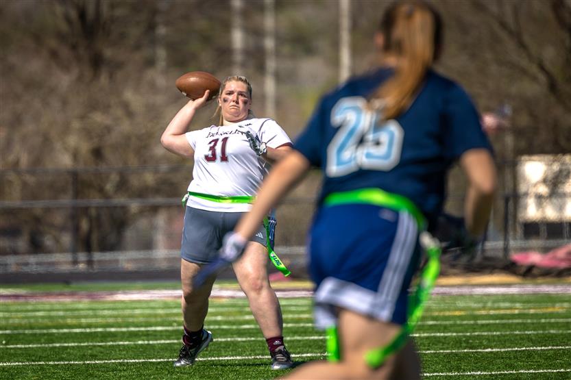 Students play flag football